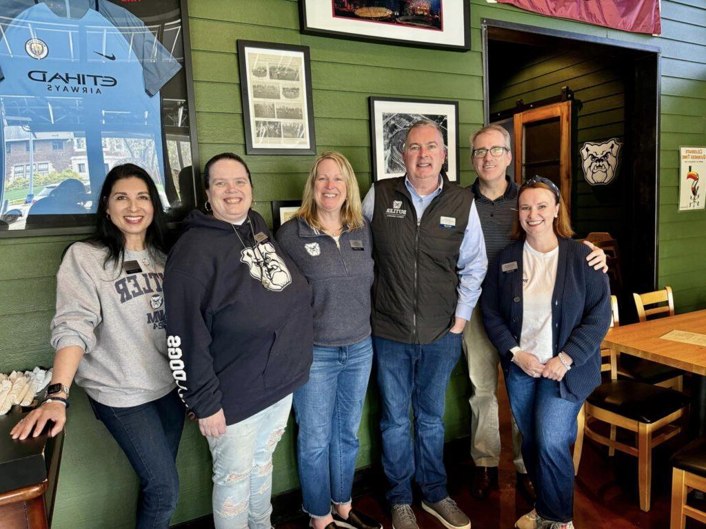 Family Council members pose next to each other in Chatham Tap